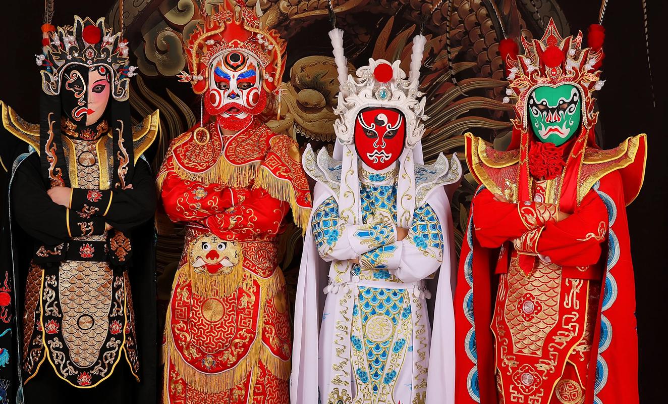 A dramatically lit Sichuan Opera performer wears a brilliant red mask and embroidered imperial robe.